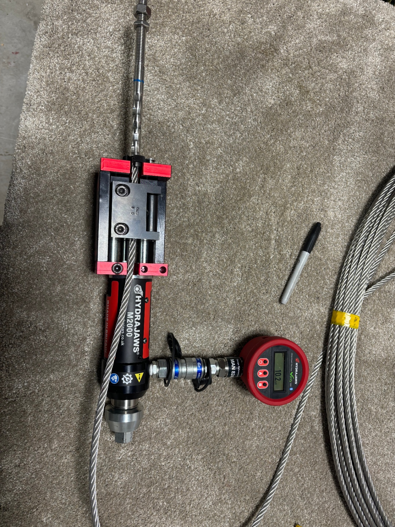Swage termination being proof-tested in the shop with Hydrajaws M2000 before installation